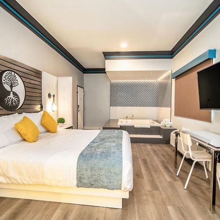 Aspire Inn Studios & Spas Беллфлауэр Экстерьер фото
