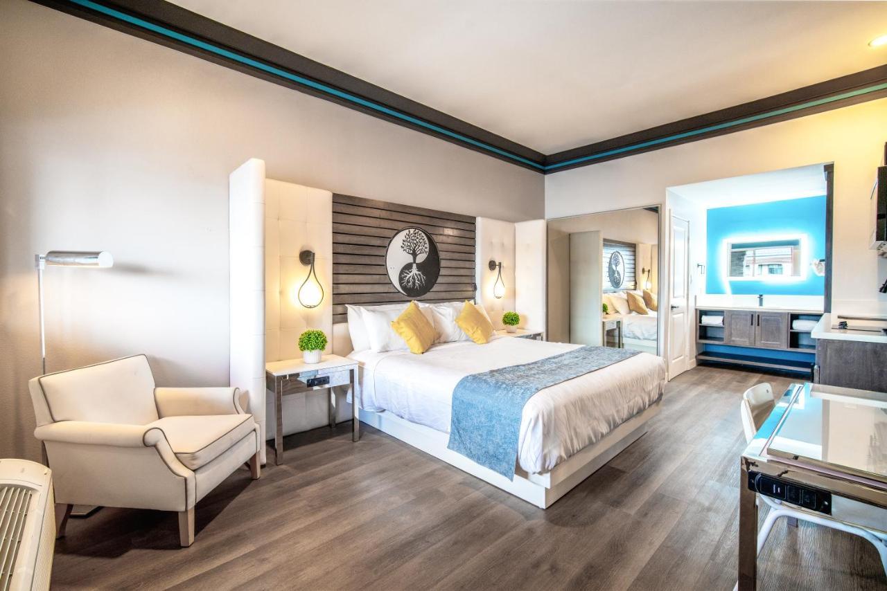 Aspire Inn Studios & Spas Беллфлауэр Экстерьер фото