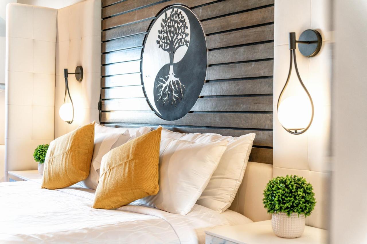 Aspire Inn Studios & Spas Беллфлауэр Экстерьер фото