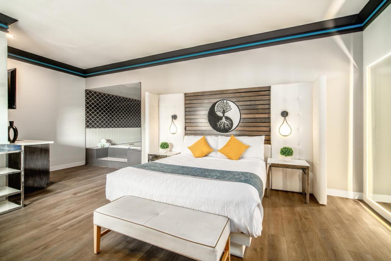 Aspire Inn Studios & Spas Беллфлауэр Экстерьер фото