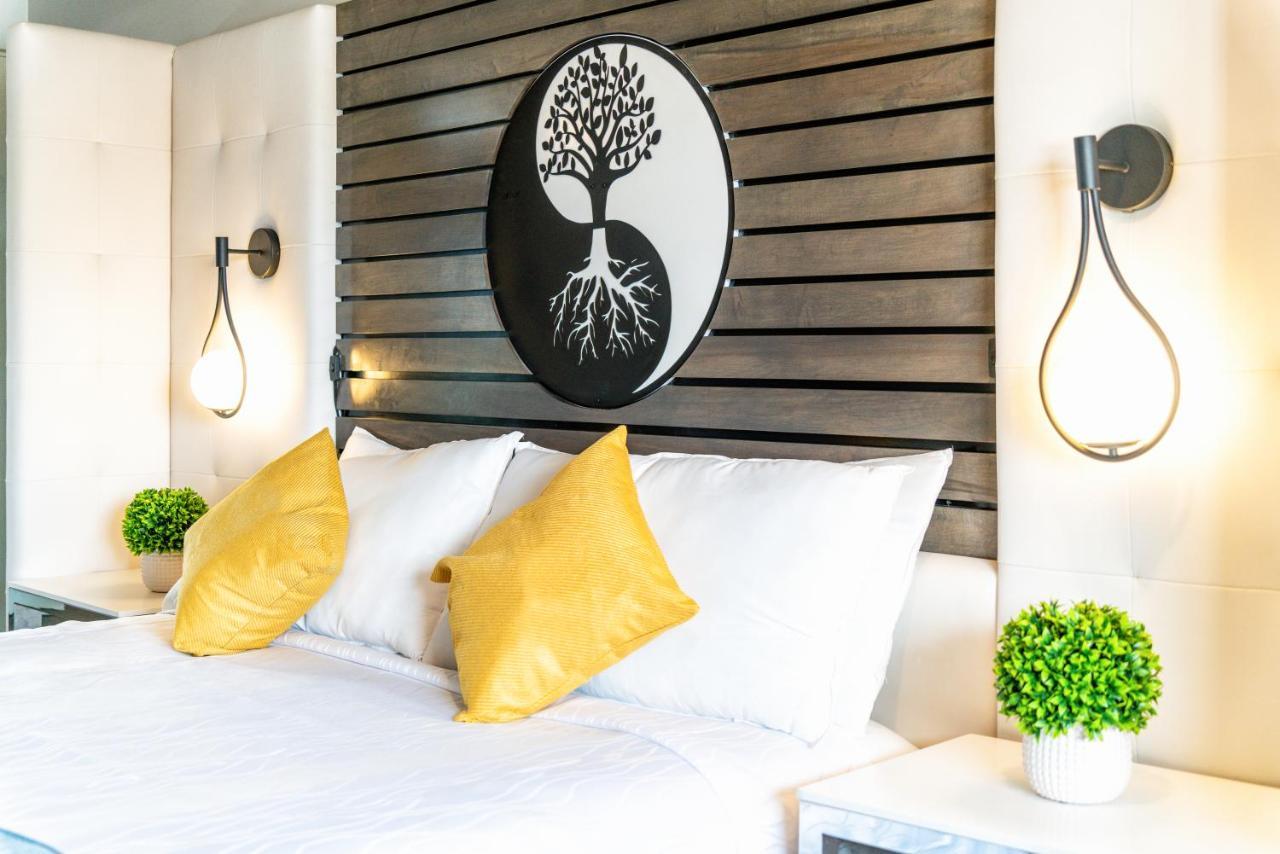 Aspire Inn Studios & Spas Беллфлауэр Экстерьер фото