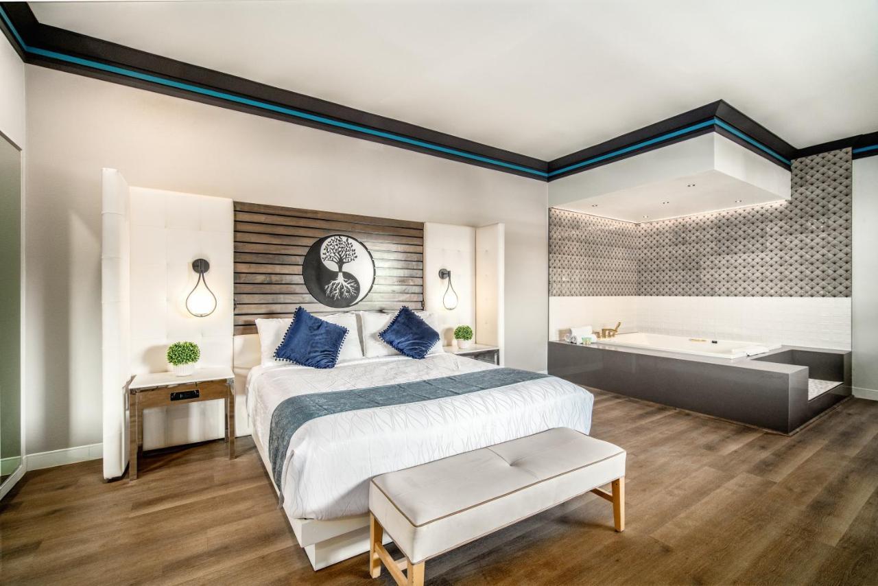 Aspire Inn Studios & Spas Беллфлауэр Экстерьер фото