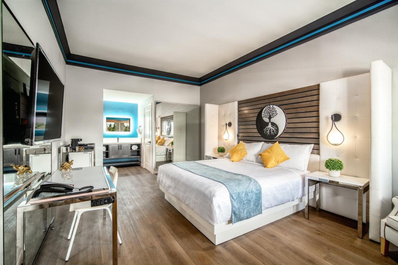 Aspire Inn Studios & Spas Беллфлауэр Экстерьер фото