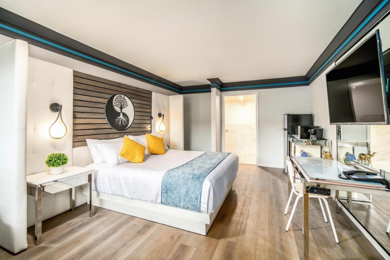Aspire Inn Studios & Spas Беллфлауэр Экстерьер фото